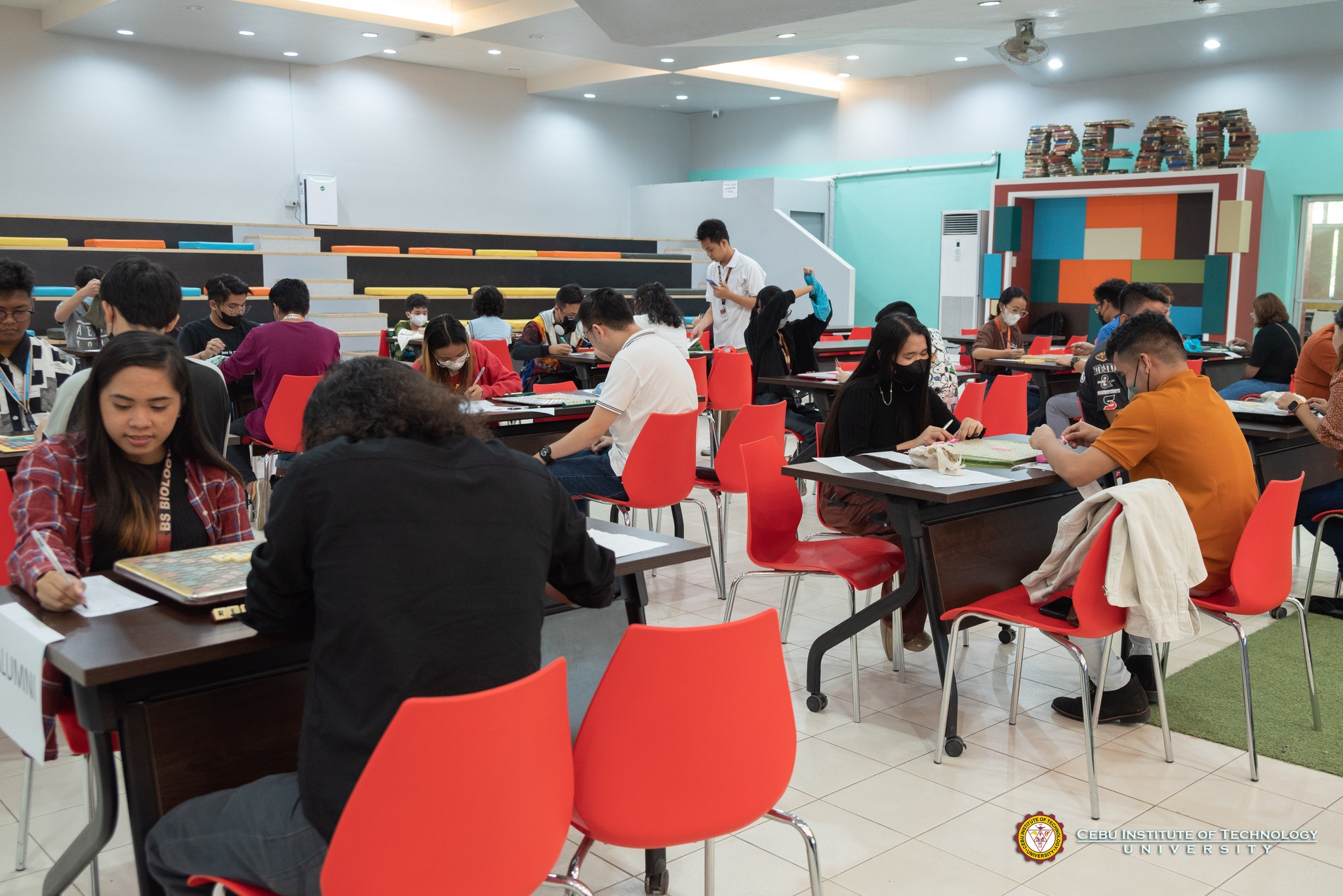When not used as a place of study, the activity center is also an avenue for different learning opportunities for studies, such as this Scrabble tournament among students and alumni.