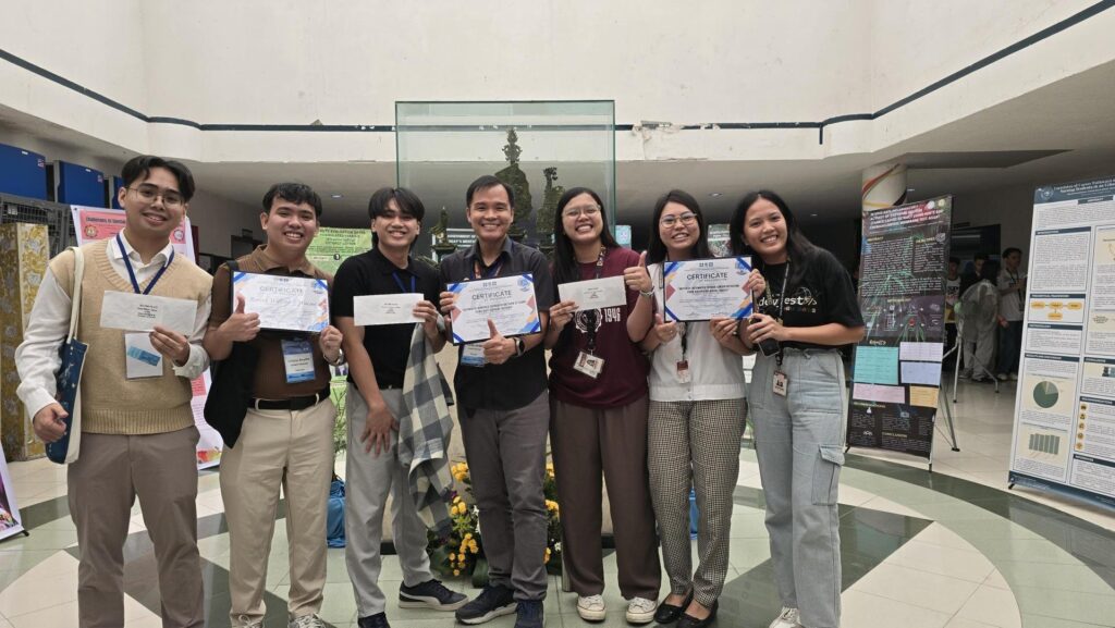 CIT University professor with students who won for their innovation projects